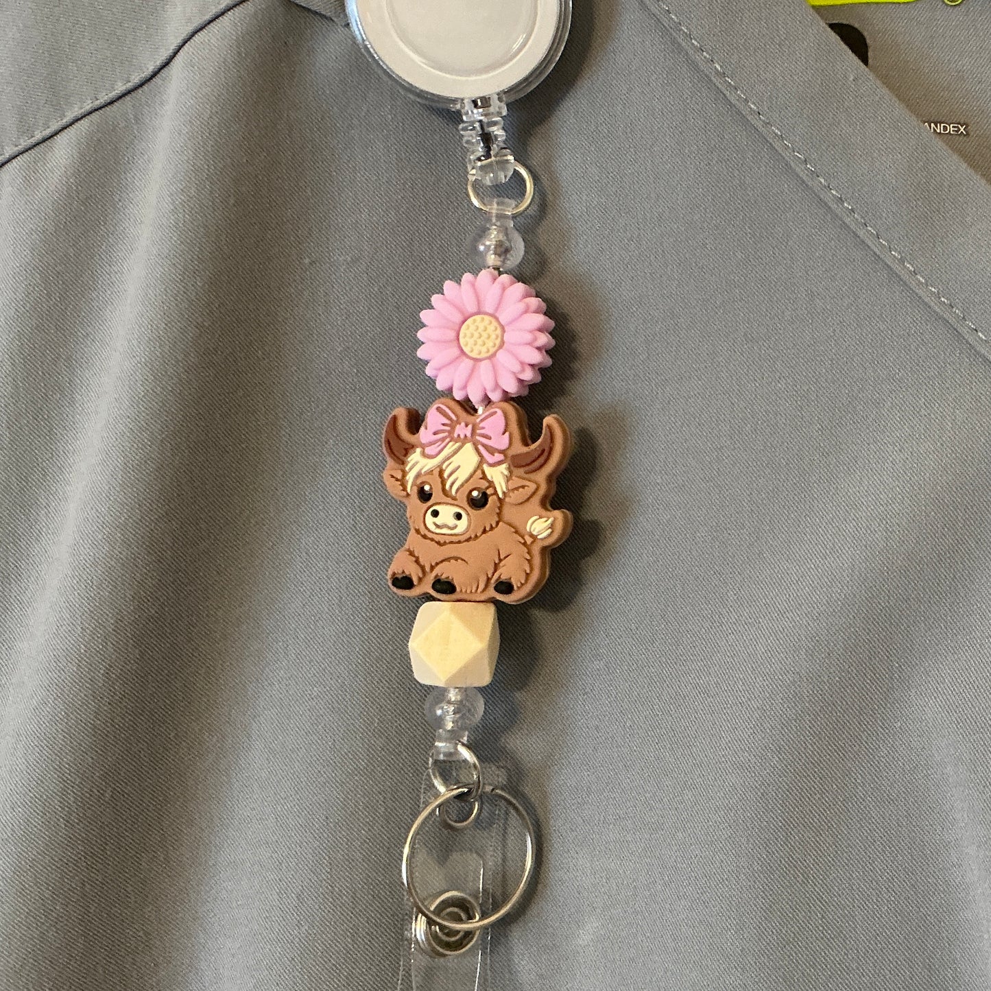Highland Cow w/Flower Badge Reel